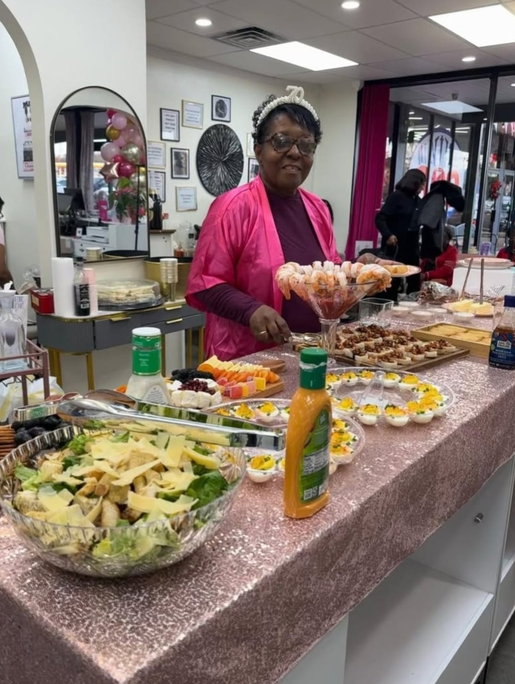 Spa party food spread at Sinkor — shrimp cocktail, deviled eggs, charcuterie board, salad, fresh spreads