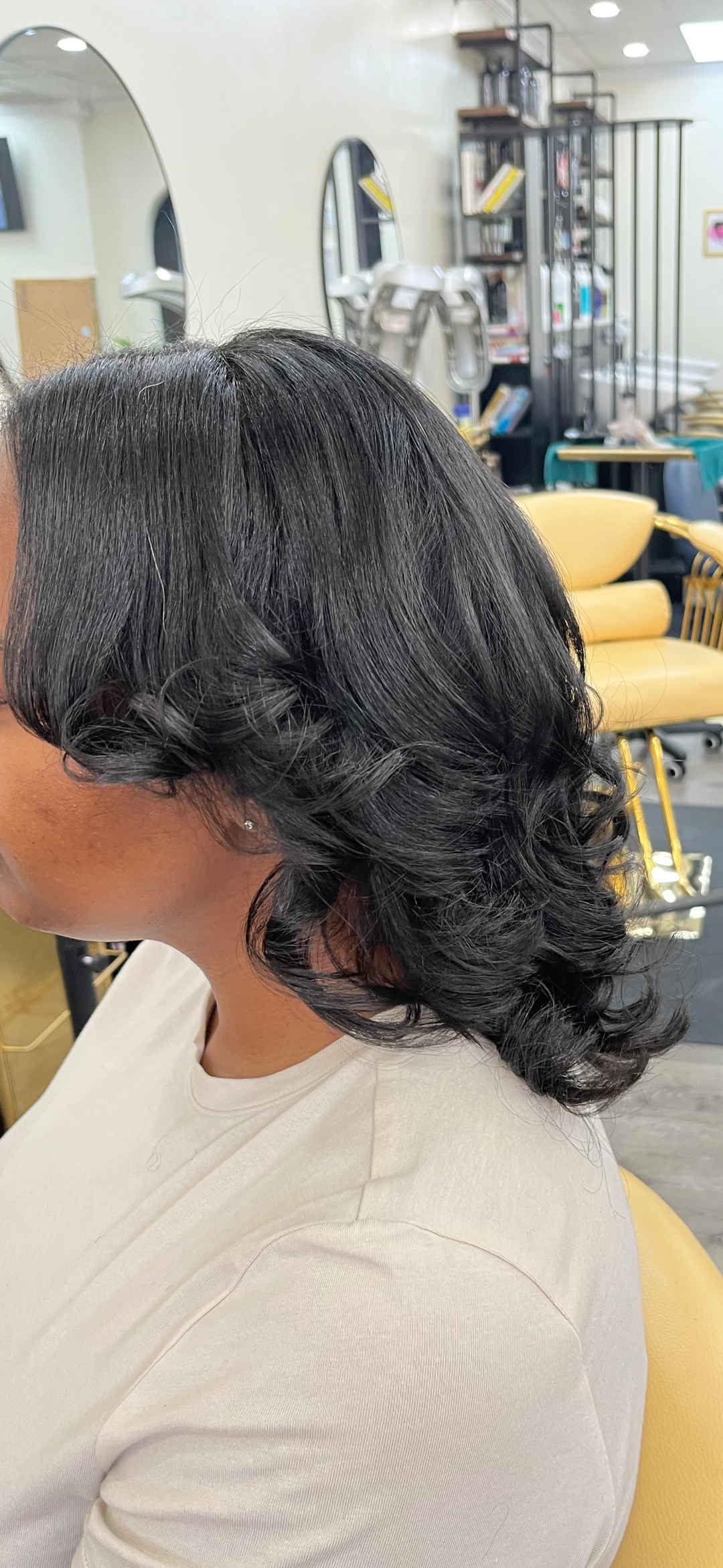 Emerald green silk press on natural hair at Sinkor Beauty Salon